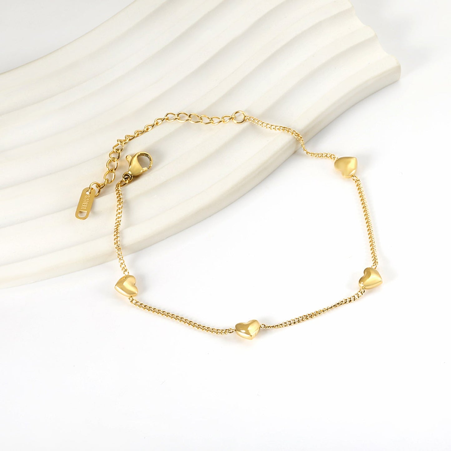 Bracelet à breloques cœur pêche