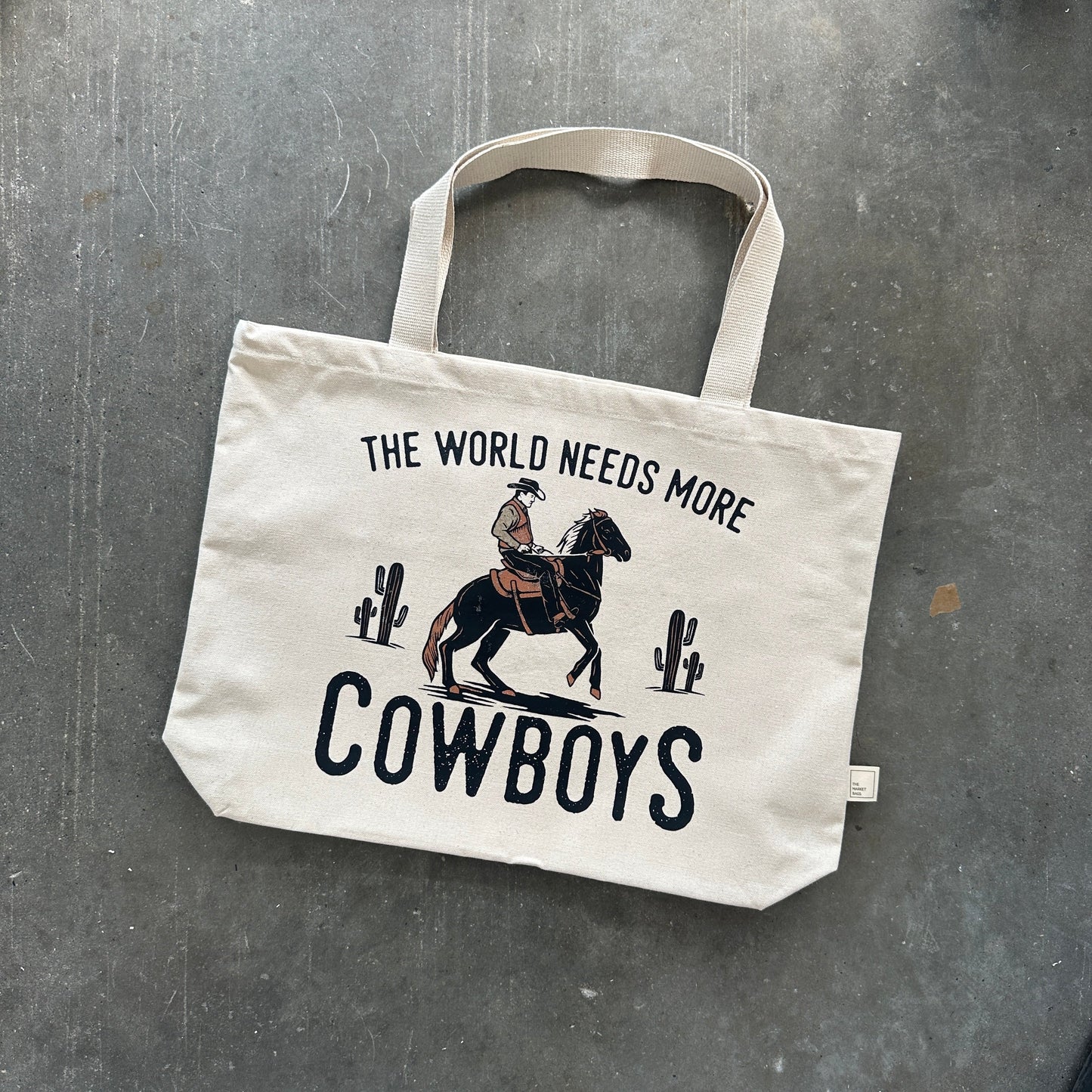 The World Needs More Cowboys Tote Bag