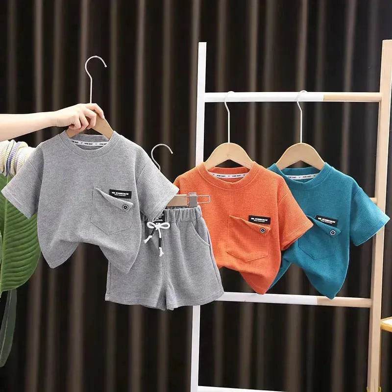 Ensemble deux pièces d'été décontracté pour enfants, T-shirt à manches courtes en coton de couleur unie et short