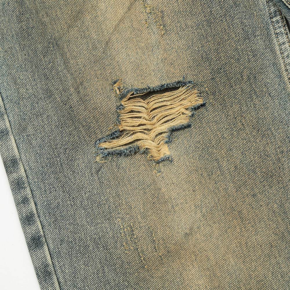 Pantalon en jean pour homme à effet usé, délavage industriel