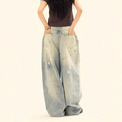 Jeans amples délavés et déchirés décontractés, style unisexe amincissant avec motifs éclaboussures d'encre pour hommes et femmes
