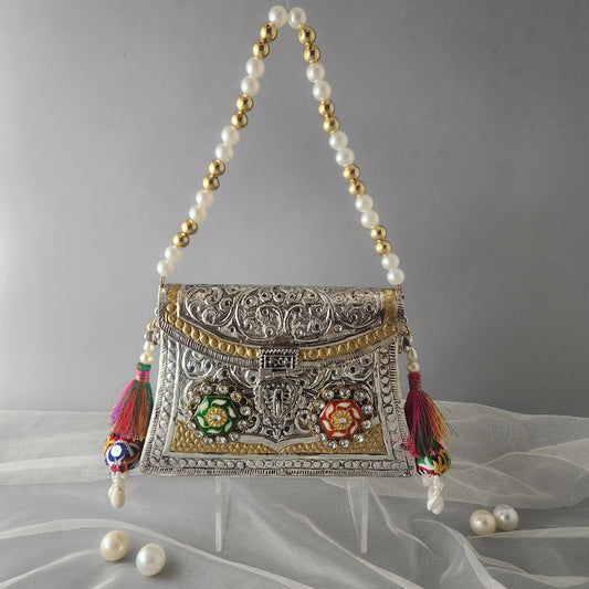 Pochette en métal héritage royal