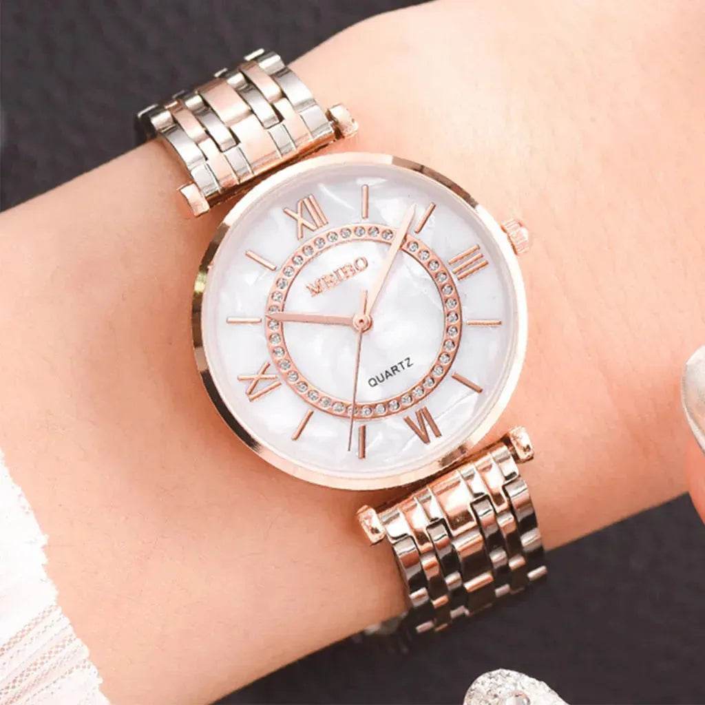 Montre à quartz dorée pour femme