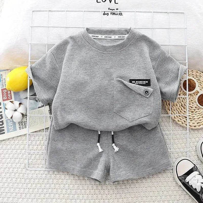 Ensemble deux pièces d'été décontracté pour enfants, T-shirt à manches courtes en coton de couleur unie et short