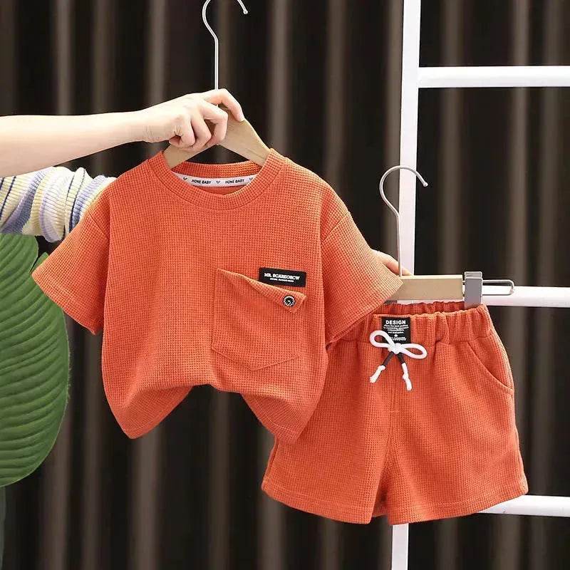 Ensemble deux pièces d'été décontracté pour enfants, T-shirt à manches courtes en coton de couleur unie et short