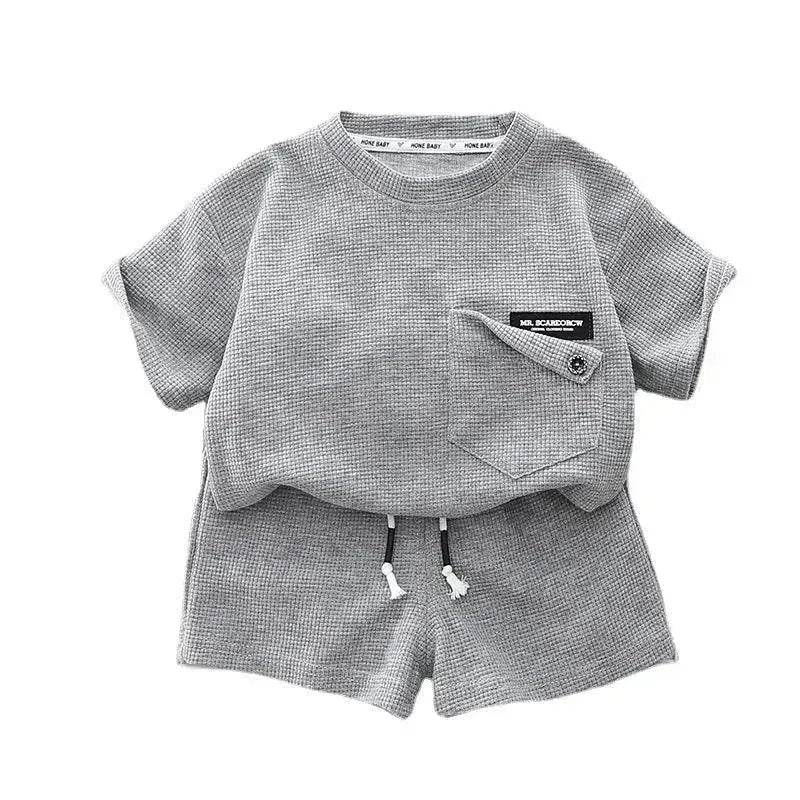 Ensemble deux pièces d'été décontracté pour enfants, T-shirt à manches courtes en coton de couleur unie et short