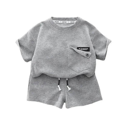 Ensemble deux pièces d'été décontracté pour enfants, T-shirt à manches courtes en coton de couleur unie et short