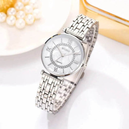 Montre à quartz dorée pour femme