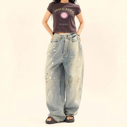 Jeans amples délavés et déchirés décontractés, style unisexe amincissant avec motifs éclaboussures d'encre pour hommes et femmes