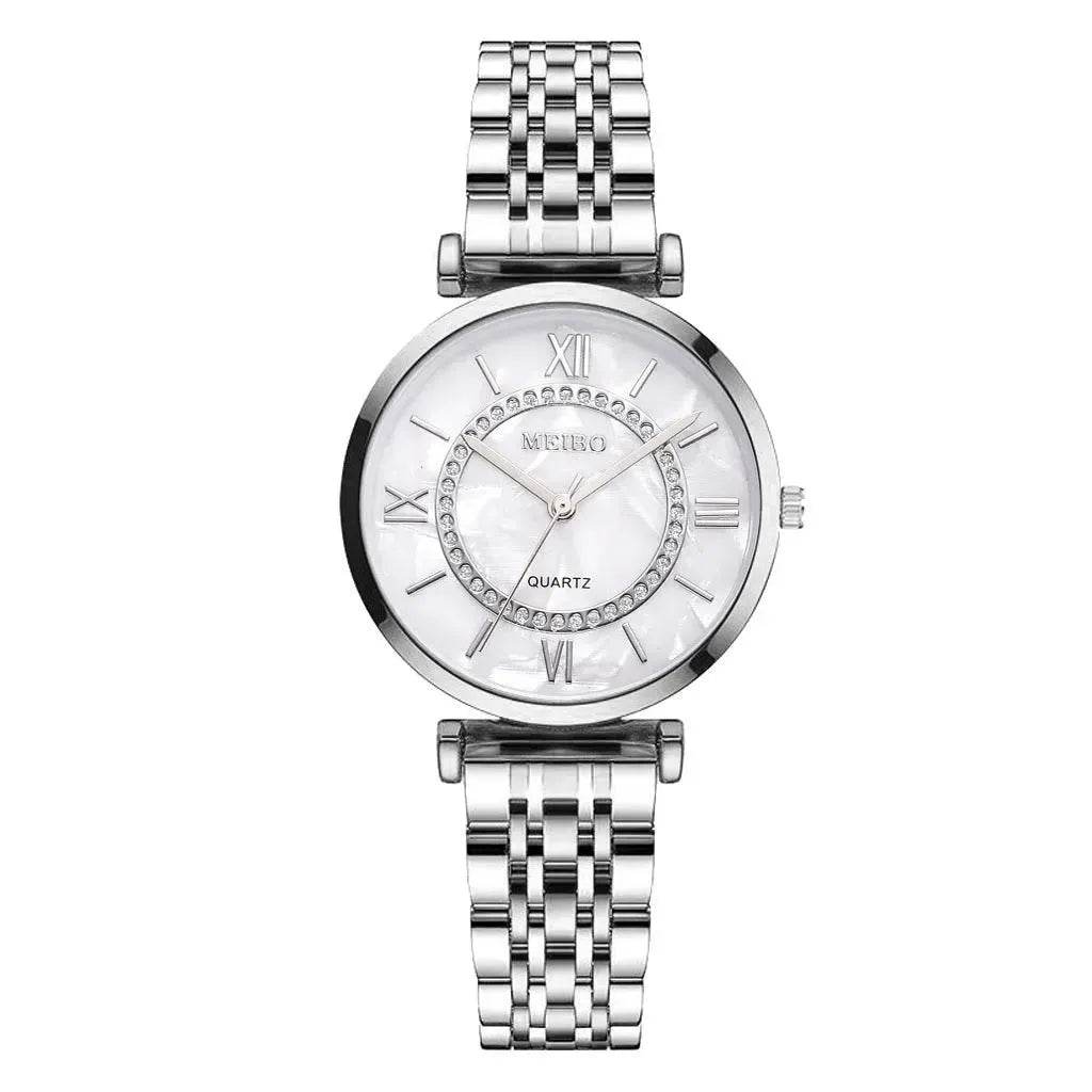 Montre à quartz dorée pour femme