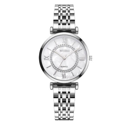 Montre à quartz dorée pour femme