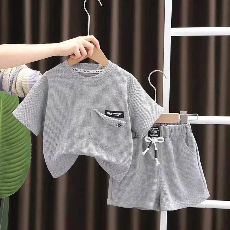 Ensemble deux pièces d'été décontracté pour enfants, T-shirt à manches courtes en coton de couleur unie et short