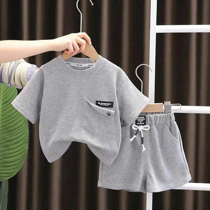 Ensemble deux pièces d'été décontracté pour enfants, T-shirt à manches courtes en coton de couleur unie et short