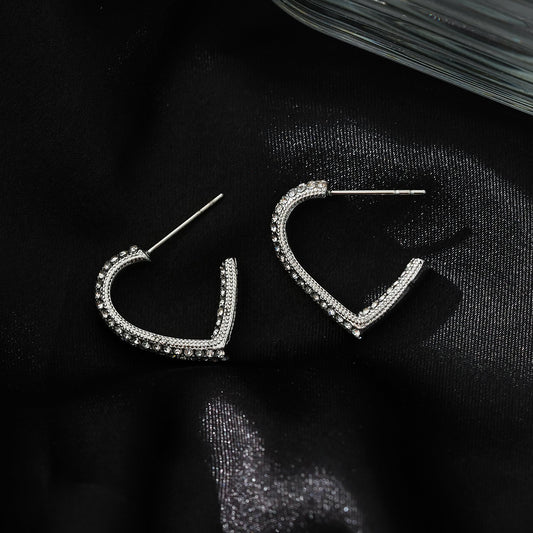 Style ANJAR Or blanc (ton argenté) : Créoles en forme de cœur incrustées de pierres précieuses en Zircone