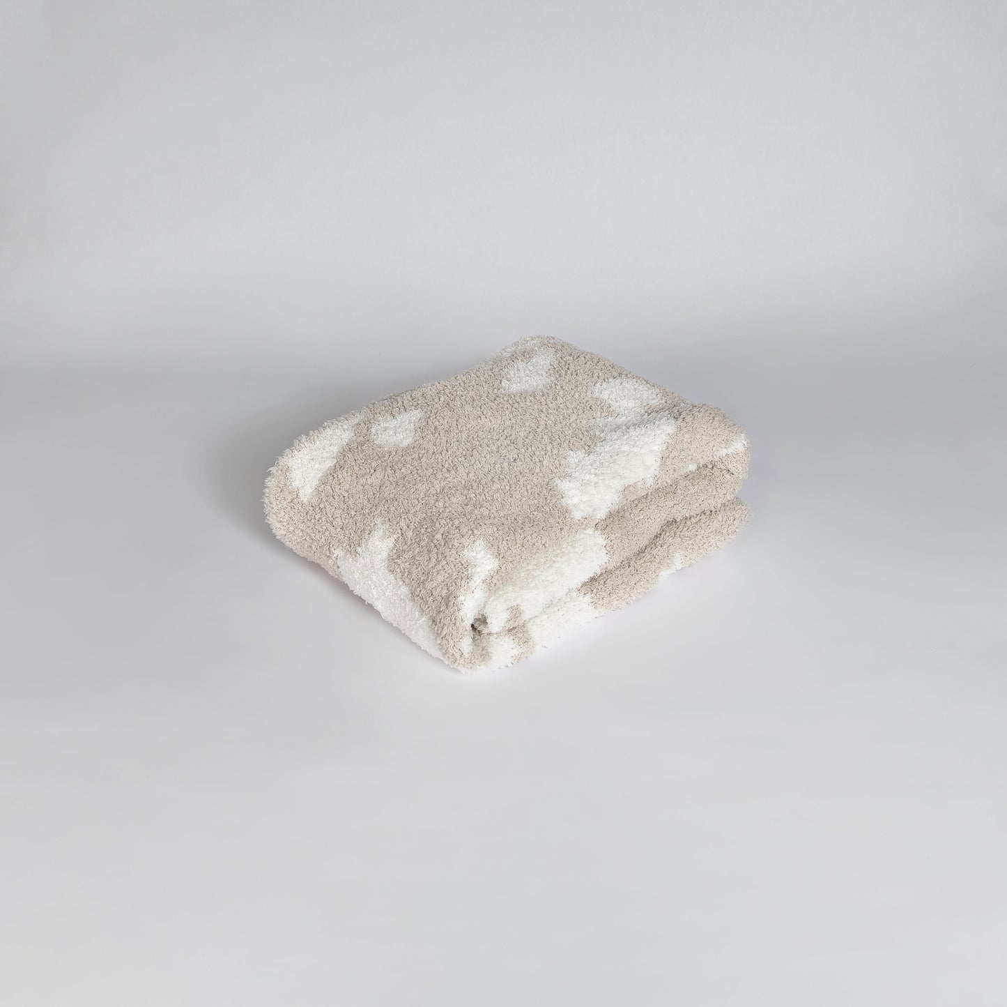 Blushing Beige & White Cow Print Toddler Blanket