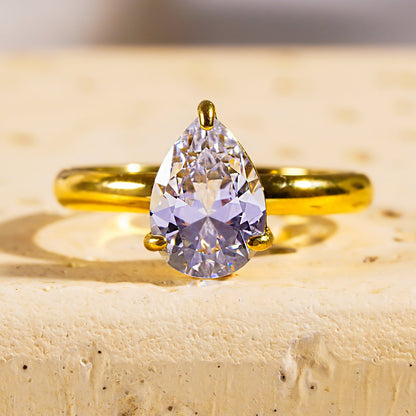 DIMONDA: Classic Gold Ring with Prominent Teardrop Zirconia Centerpiece