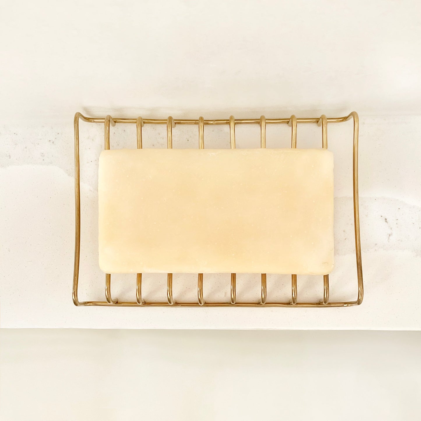 Porte-savon en métal doré