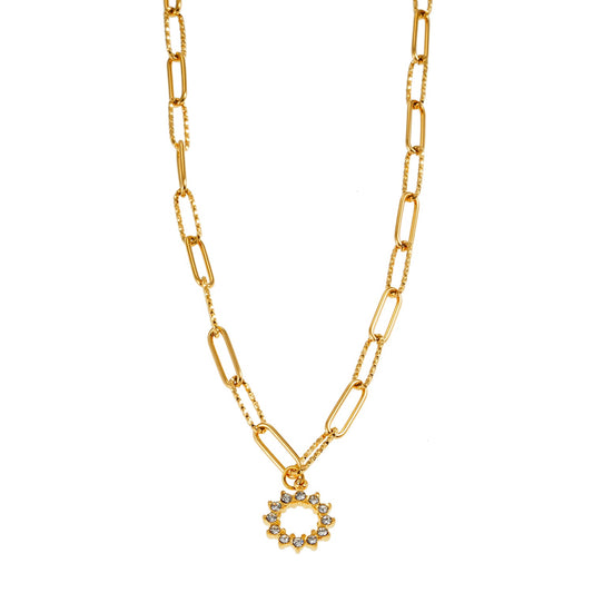 FRETTA : Collier à Pendentif Étoile Rayonnante en Zirconium avec Chaîne Trombone en Plaqué Or.