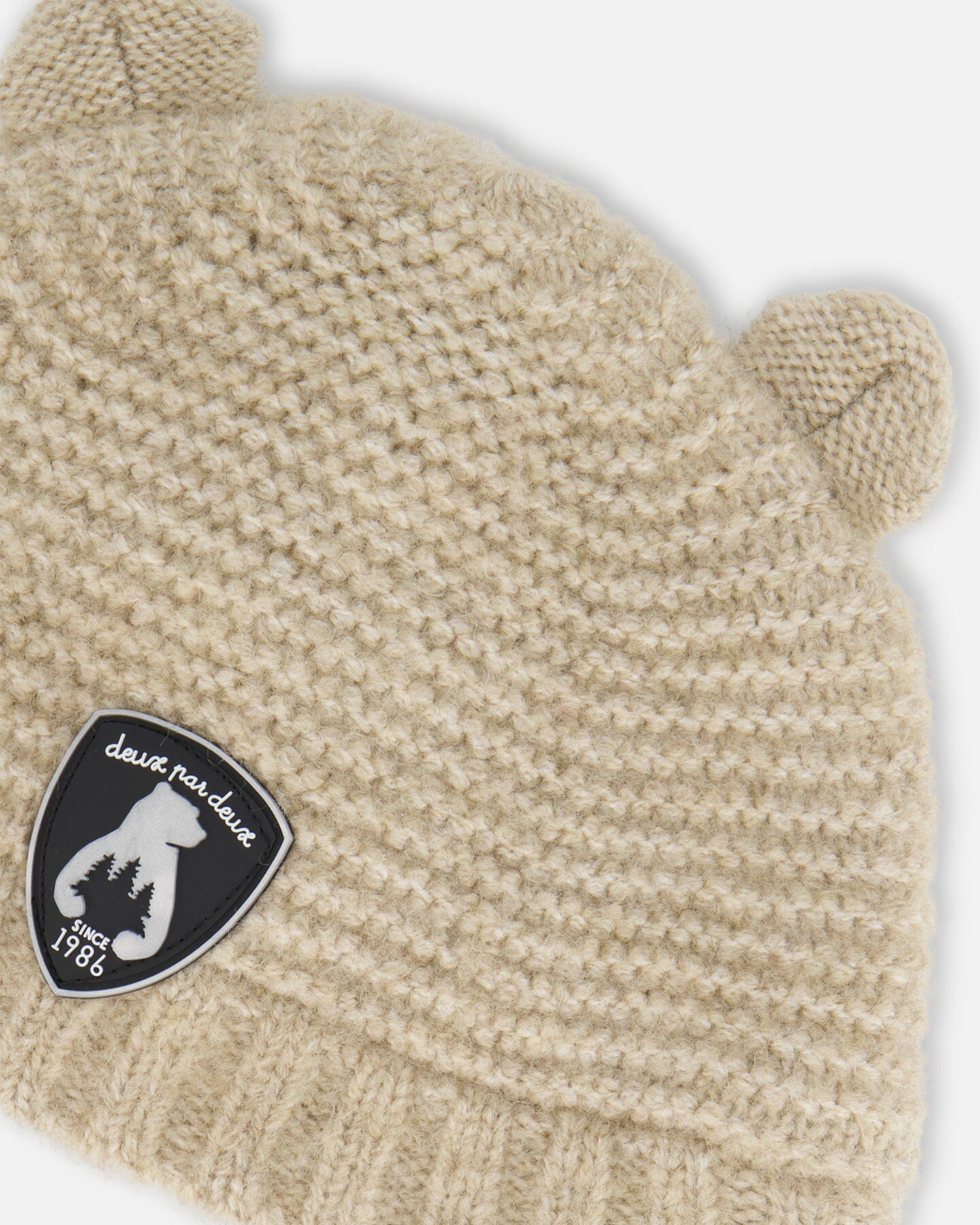 Bonnet en tricot avec oreilles beige