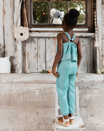 Combinaison salopette en chambray avec broderie bleu clair