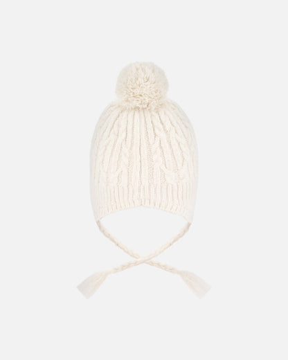 Bonnet d'hiver doublé avec pompon blanc cassé
