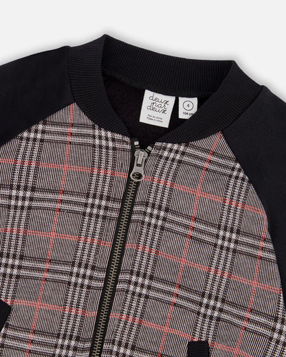 Veste bi-matière à fermeture éclair sur le devant, écossaise grise et noire