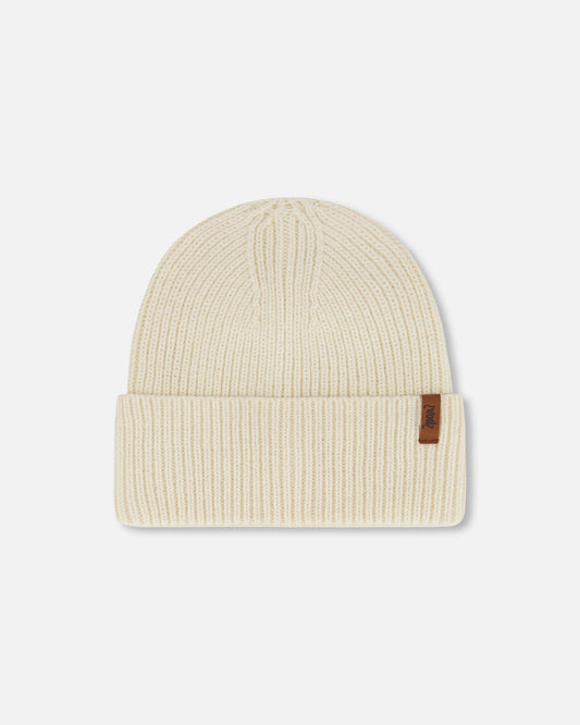 Bonnet en tricot mi-saison beige clair