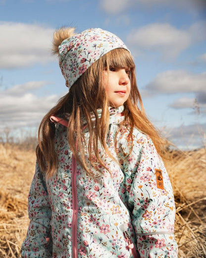 Bonnet en jersey extensible bleu à mini imprimé fleuri avec pompon