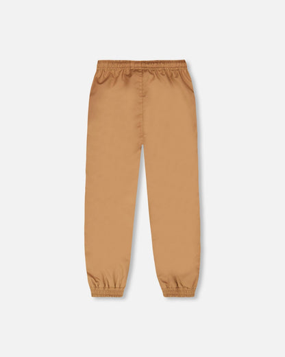 Pantalon de pluie en polyester recyclé brun clair