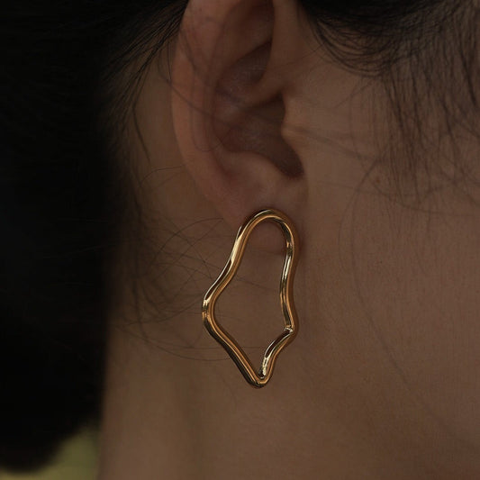 Boucles d'oreilles créoles irrégulières MARTINA en or