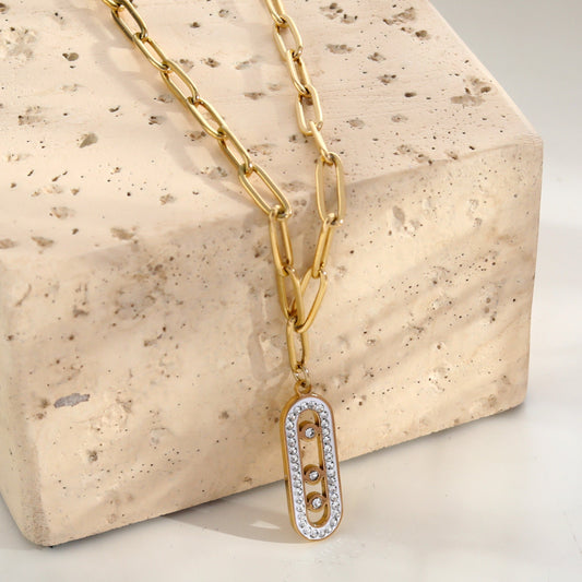 Chaîne Morna avec pendentif géométrique or et zircons