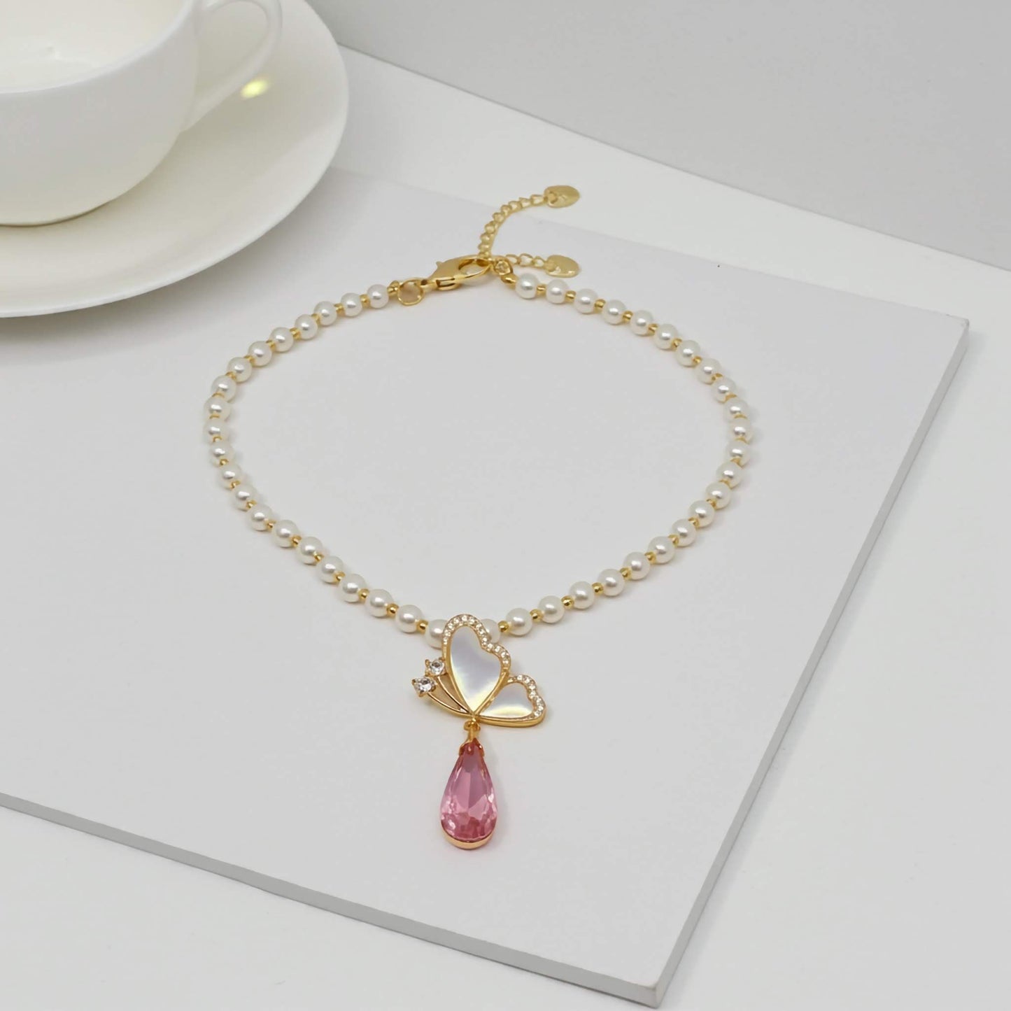 Floral Butterfly Pearl Necklace in Soft Pink Shade