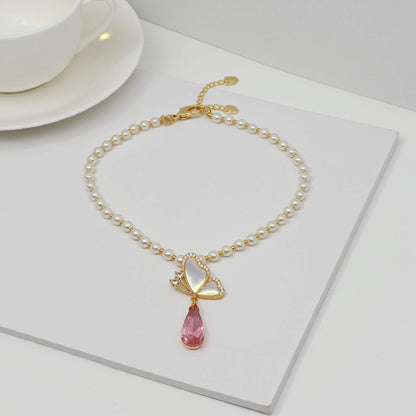 Floral Butterfly Pearl Necklace in Soft Pink Shade
