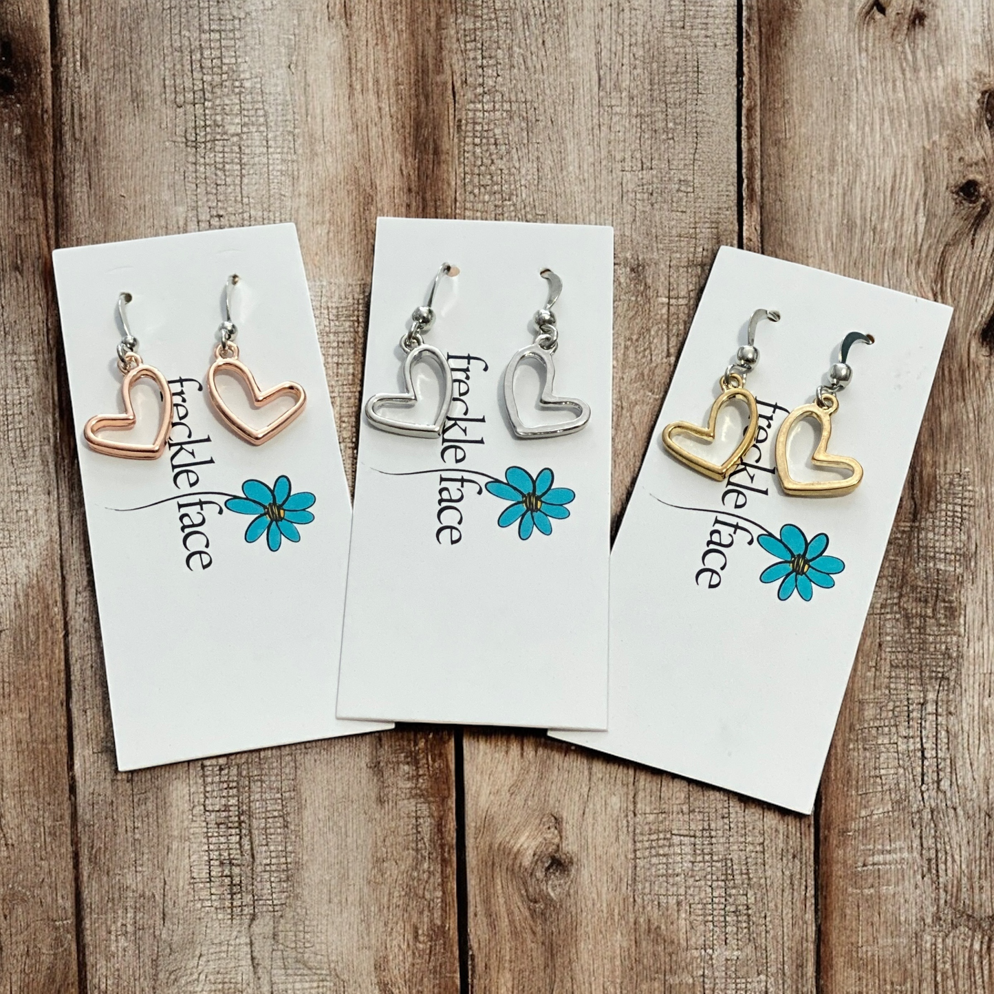Boucles d'oreilles pendantes cœur ouvert