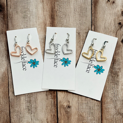 Boucles d'oreilles pendantes cœur ouvert