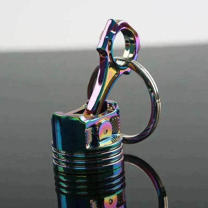 Porte-clés en métal en forme de piston