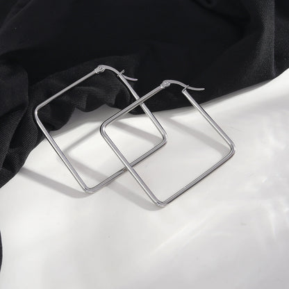 REILYNN: Square Silver Hoops - A Bold Twist on Classic Elegance