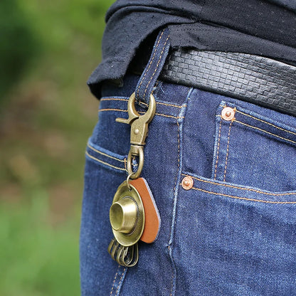 Porte-clés chapeau de cowboy rétro, pendentif porte-clés de voiture en cuir de vachette en métal bronze, souvenir des cowboys occidentaux jeunesse
