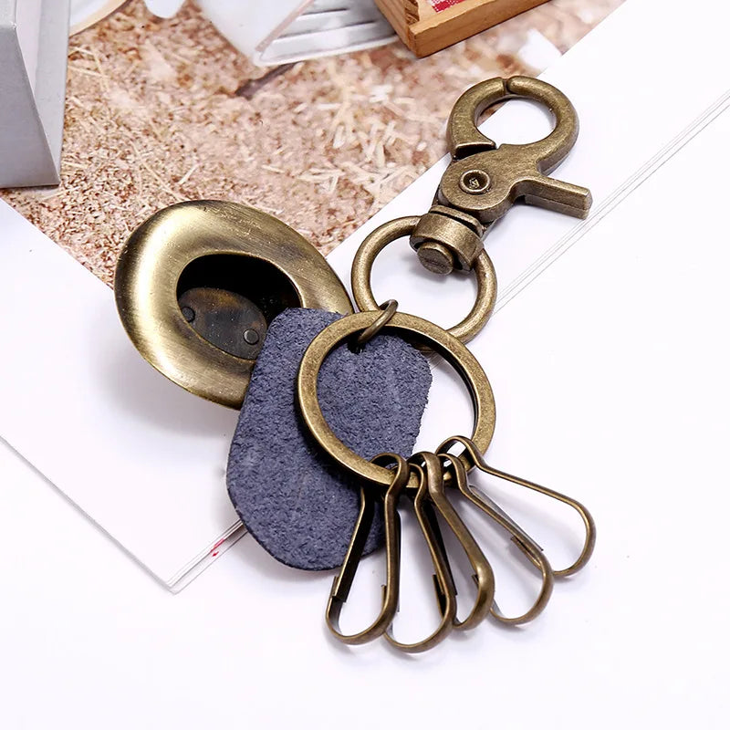 Porte-clés chapeau de cowboy rétro, pendentif porte-clés de voiture en cuir de vachette en métal bronze, souvenir des cowboys occidentaux jeunesse