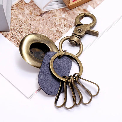 Porte-clés chapeau de cowboy rétro, pendentif porte-clés de voiture en cuir de vachette en métal bronze, souvenir des cowboys occidentaux jeunesse
