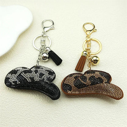 Porte-clés rétro imprimé léopard pour femmes et hommes, chapeau de Cowgirl, pompon noir, strass, breloque pour sac d'homme, porte-clés suspendu, bijoux cadeaux