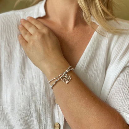 Double Strand Bracelet With Heart Pendant In Silver Plate