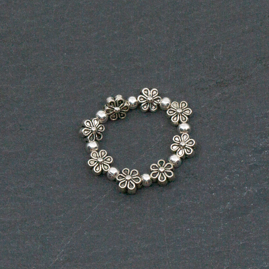 Bague fleur élastiquée en plaqué argent