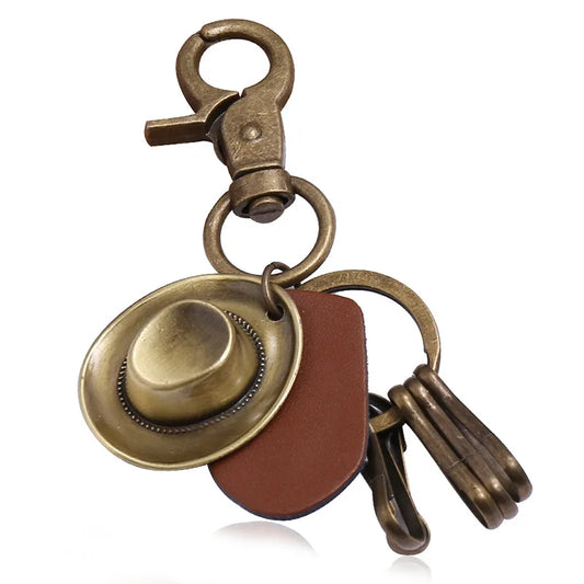 Porte-clés chapeau de cowboy rétro, pendentif porte-clés de voiture en cuir de vachette en métal bronze, souvenir des cowboys occidentaux jeunesse
