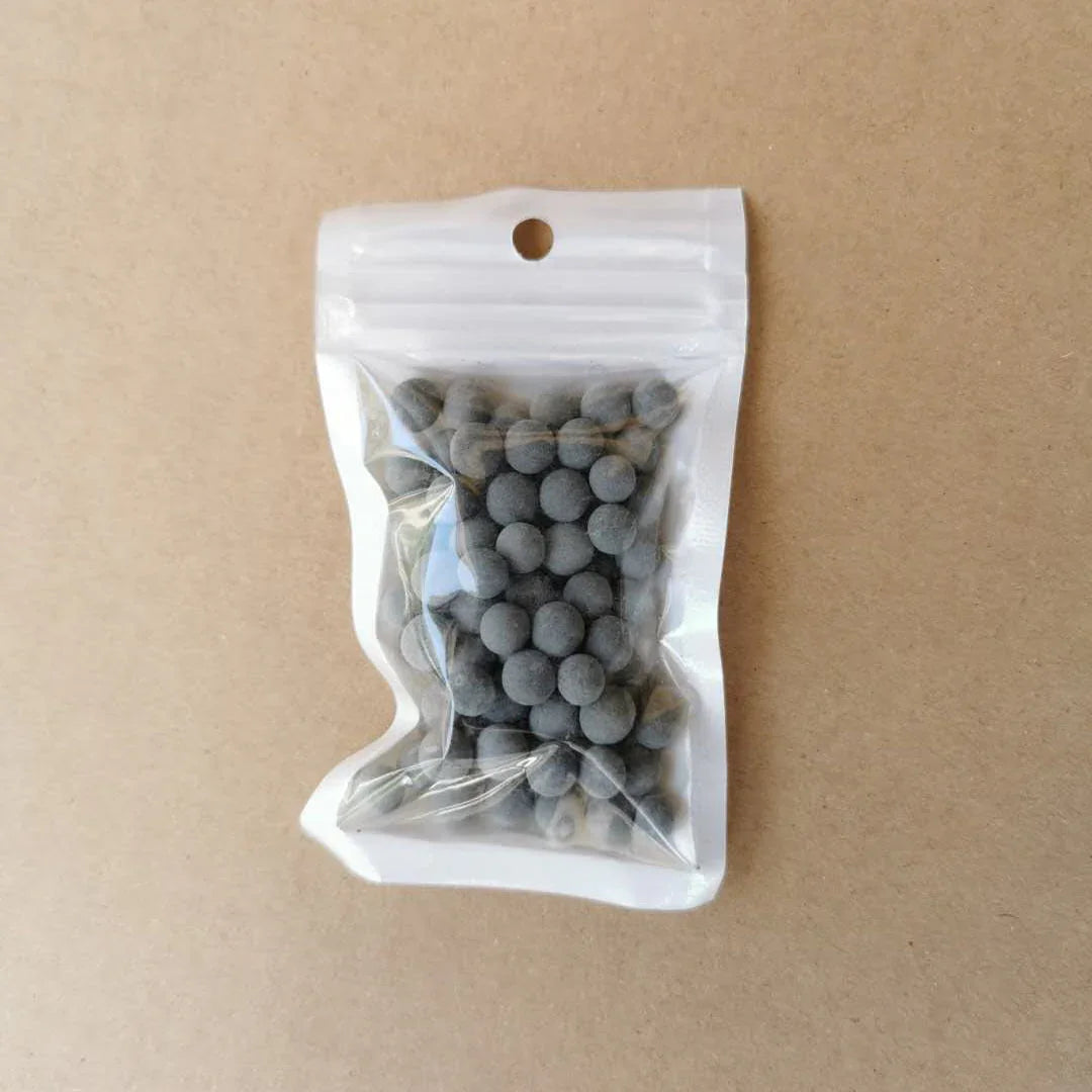 Shower filter cartridge energy ball