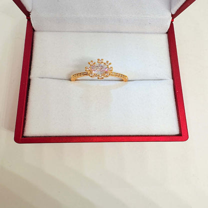 Bague en pierre claire dorée