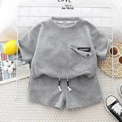 Ensemble deux pièces d'été décontracté pour enfants, T-shirt à manches courtes en coton de couleur unie et short