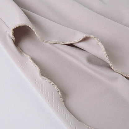 Jupe longue fendue asymétrique taille haute