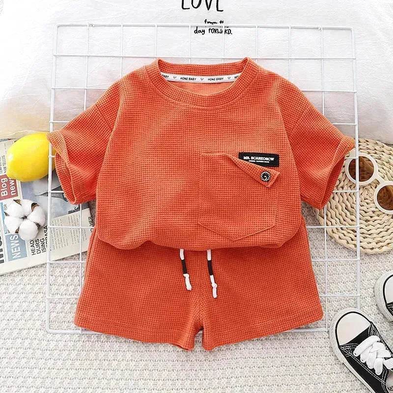 Ensemble deux pièces d'été décontracté pour enfants, T-shirt à manches courtes en coton de couleur unie et short