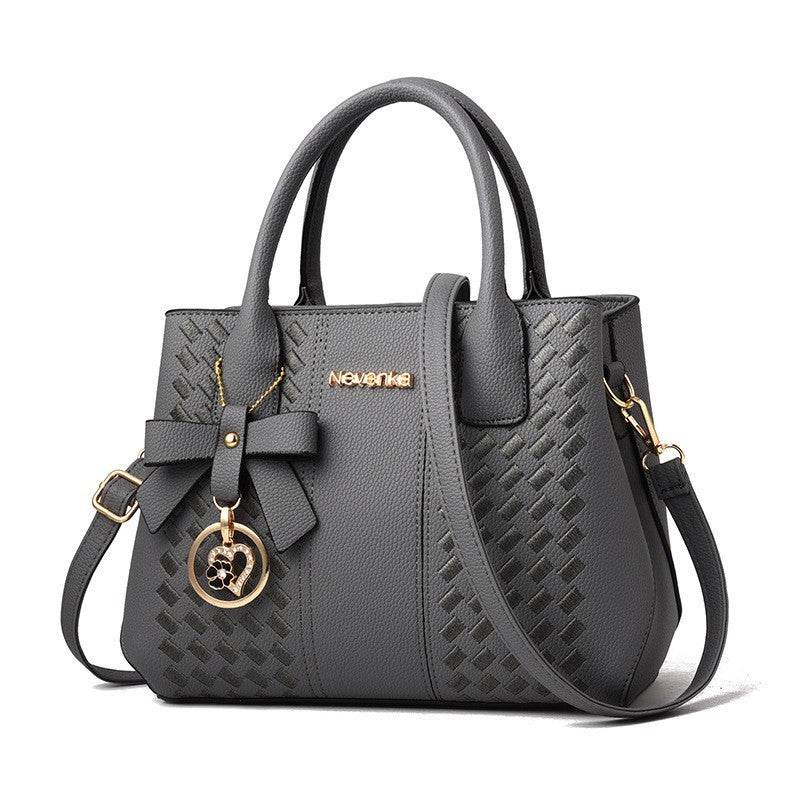 Affordable Luxury formal Handbag PU Leather Made.